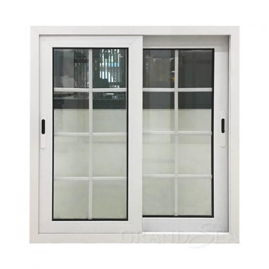 fenêtre à cadre en aluminium de couleur blanche avec design grill